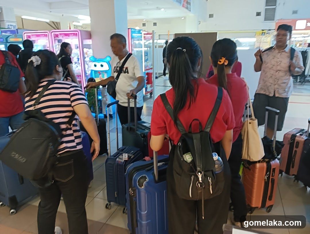 Travelers at airport terminal