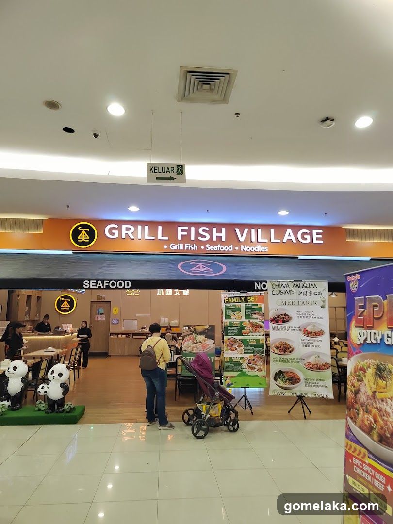 Grill Fish Village storefront interior view