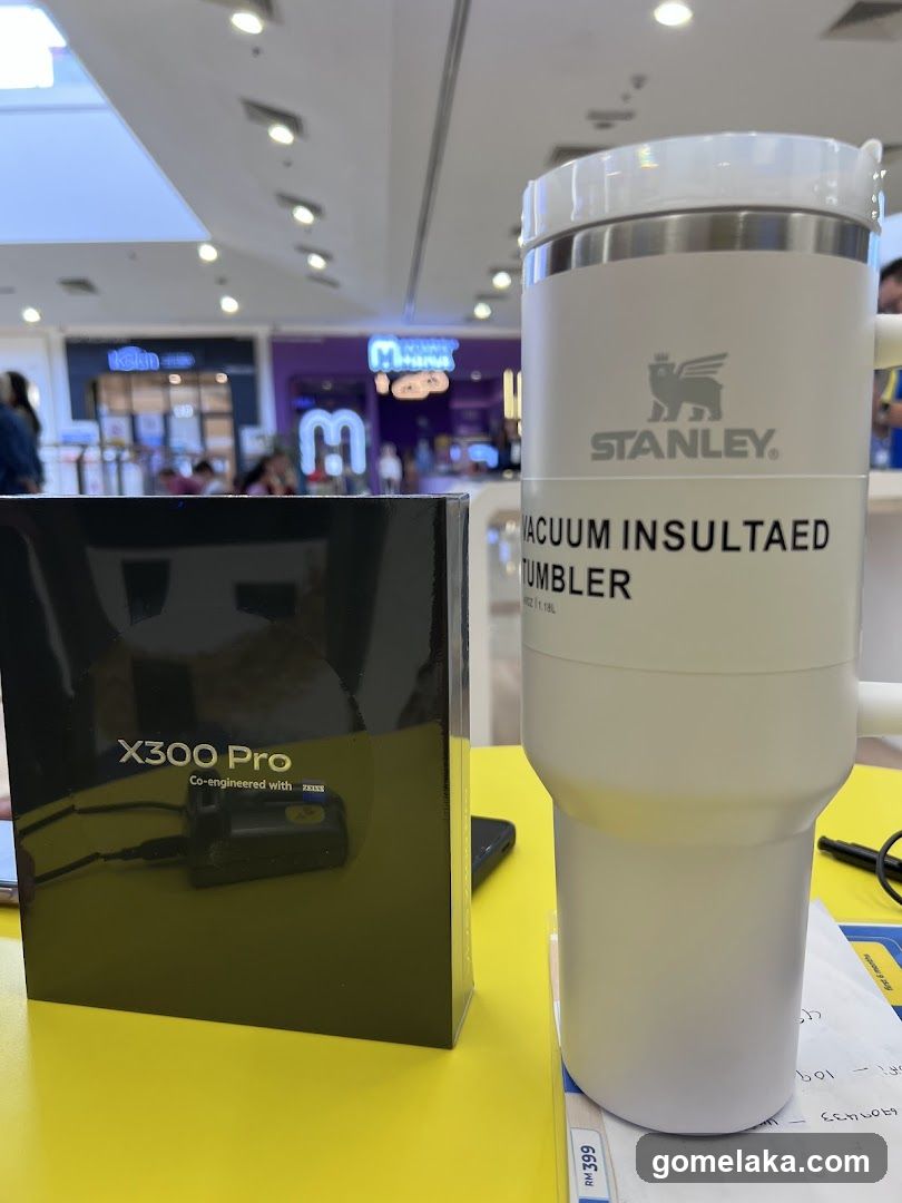 Stanley Tumbler and X300 Pro Box on Yellow Table
