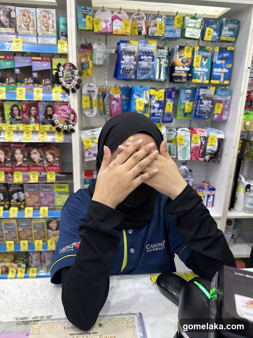 Pharmacy Staff at Counter