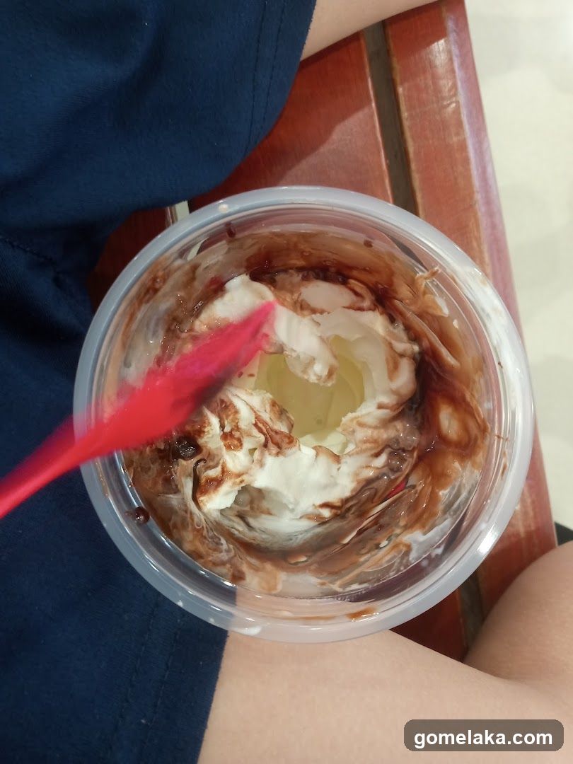 Ice cream cup with spoon