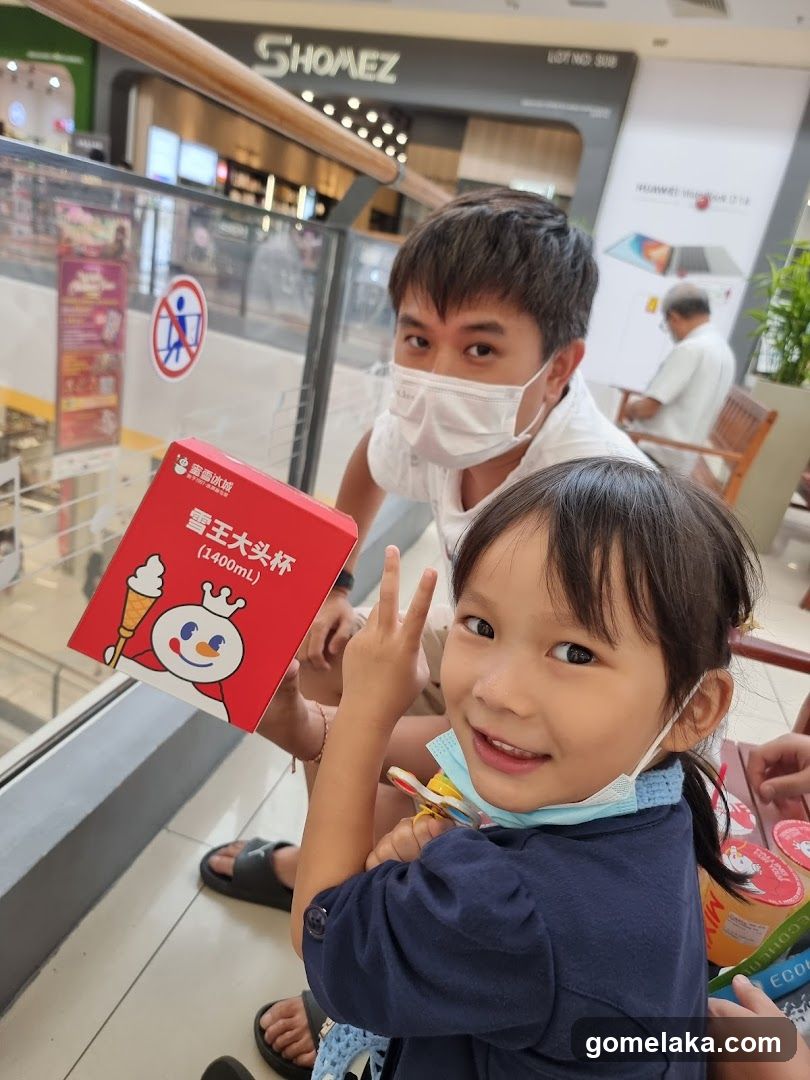 Shopping Mall Interior with Family