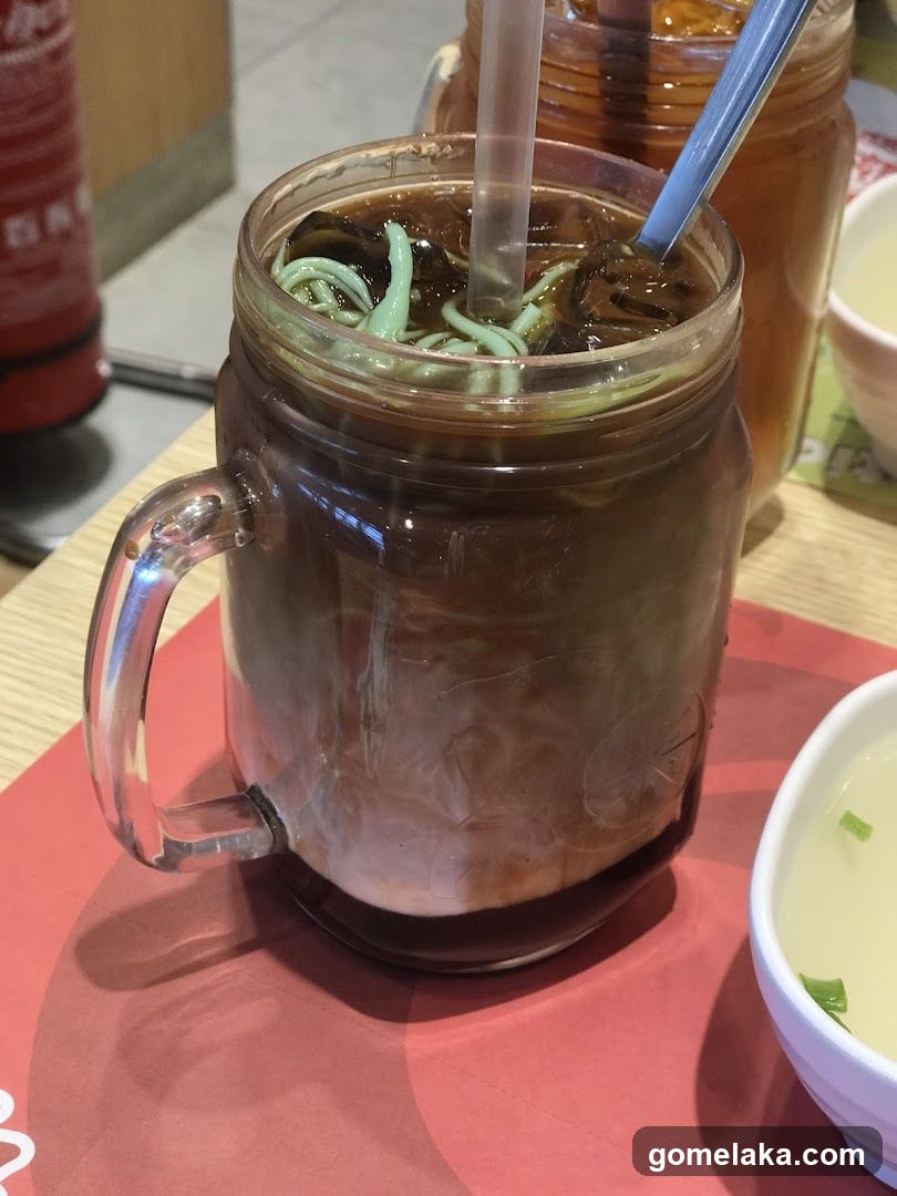 Tableside beverage with noodles