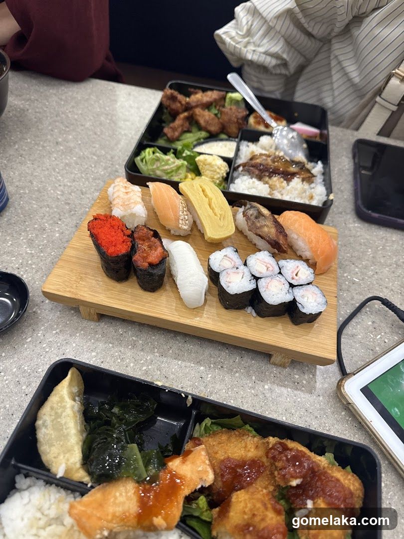 Sushi and Bento Boxes at Dining Table