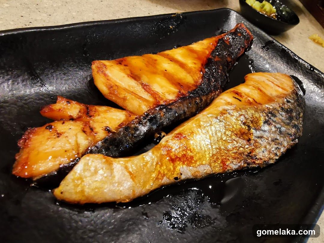 Grilled Fish on Black Plate