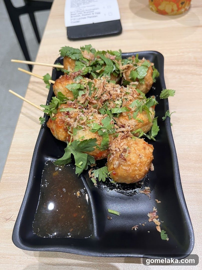 Food served on black plate