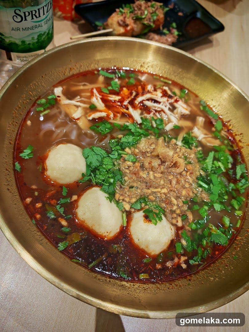 Food dish in golden bowl