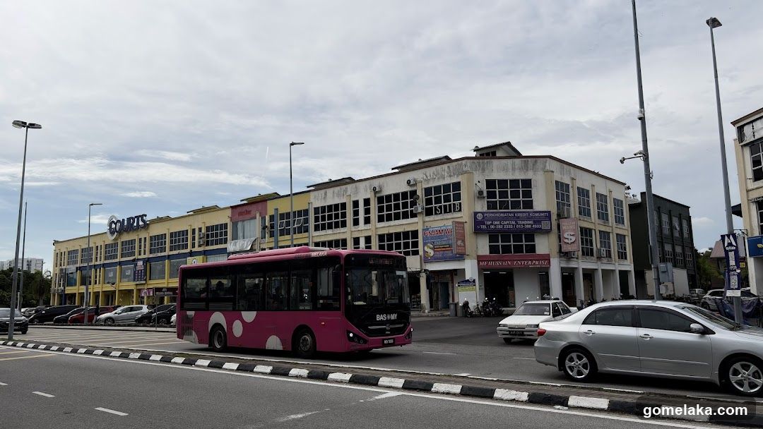 Street scene with bus and cars