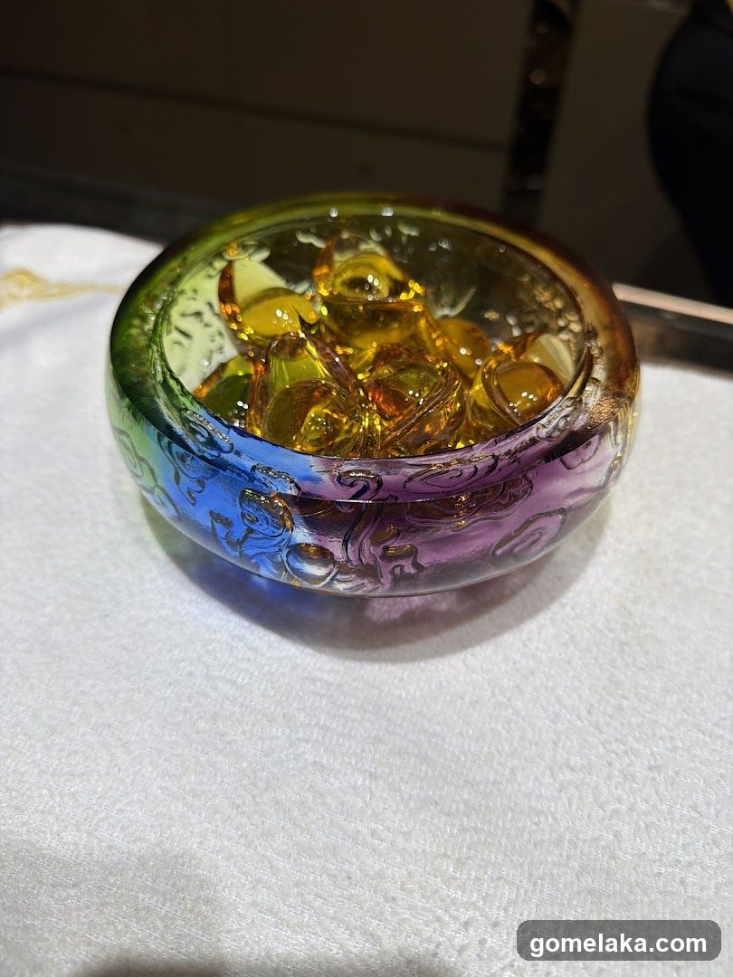 Glass bowl with decorative amber stones