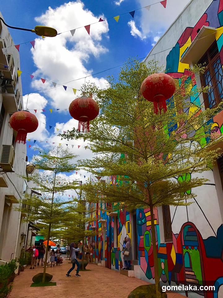 Street Scene with Murals and Lanterns