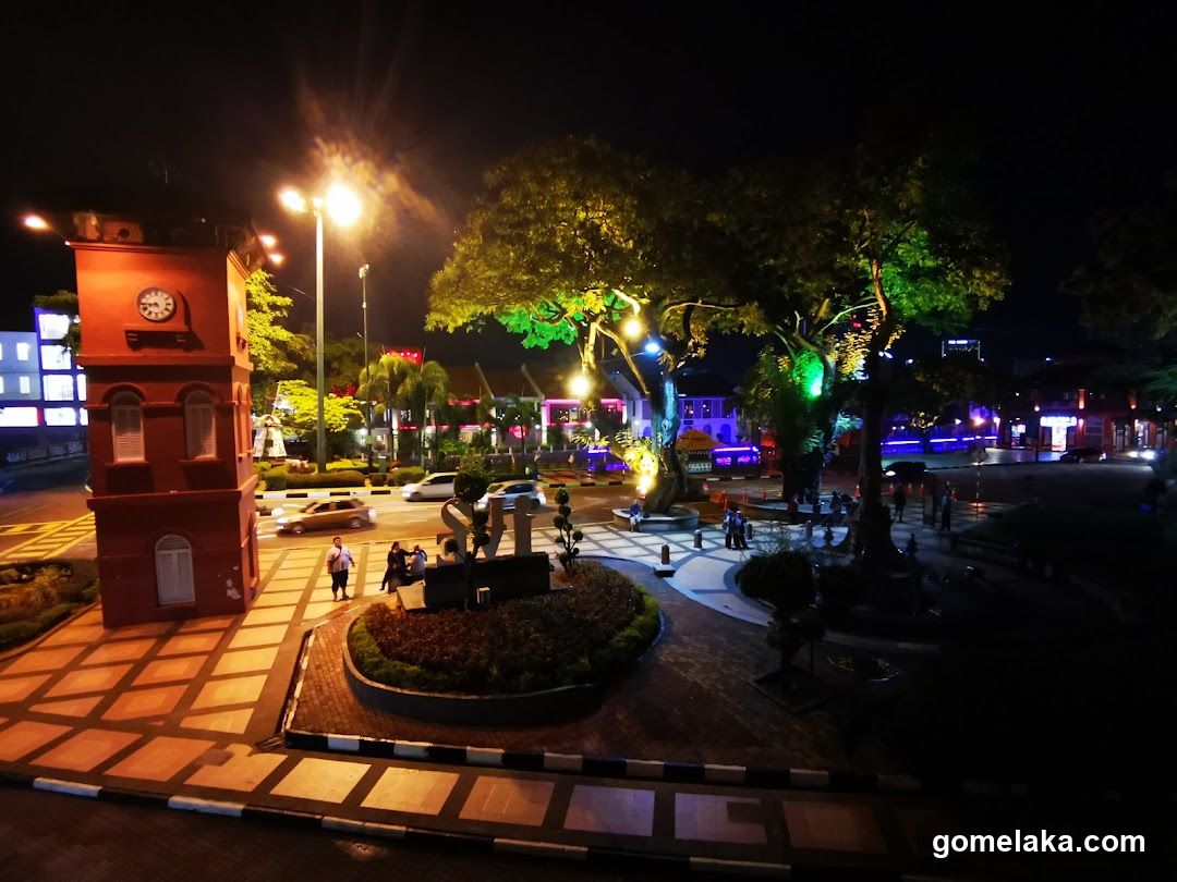 Nighttime Urban Square with Clock Tower