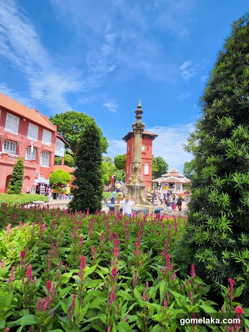 Park Scene with Fountain and Buildings