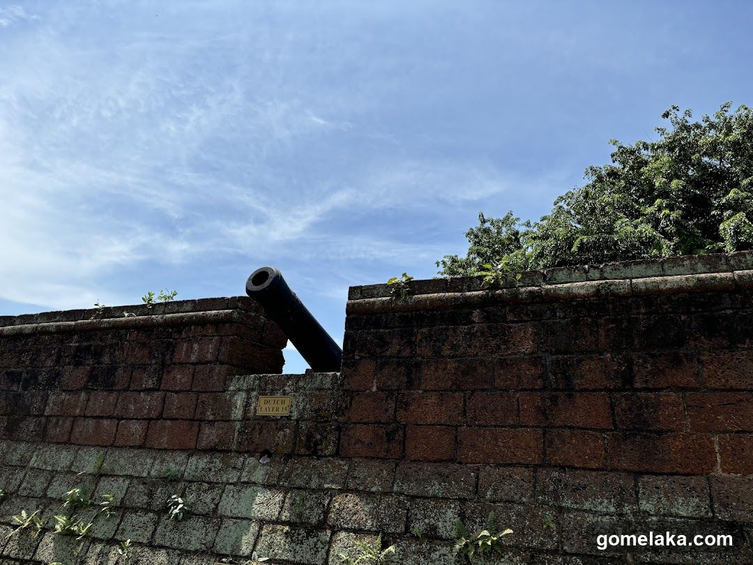 Historic Cannons on Brick Wall