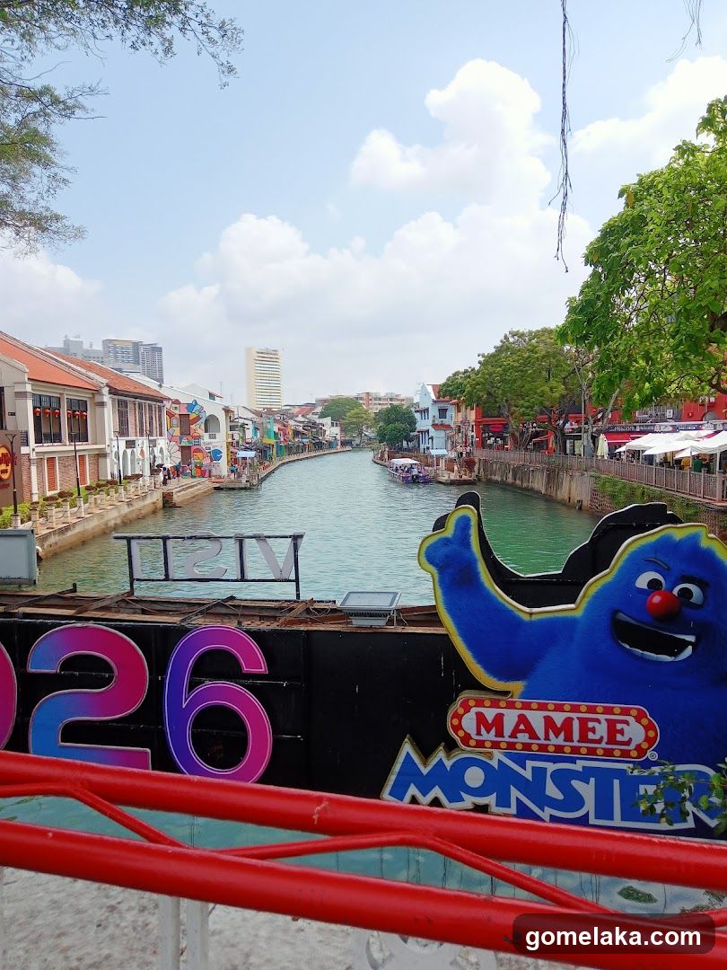 Riverfront View with Promotional Signage
