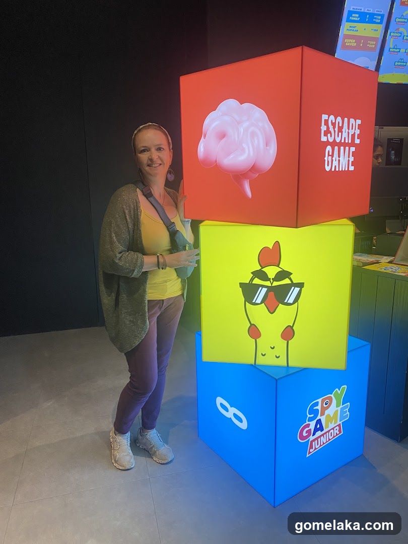 Person with Escape Game and Spy Game Junior Display