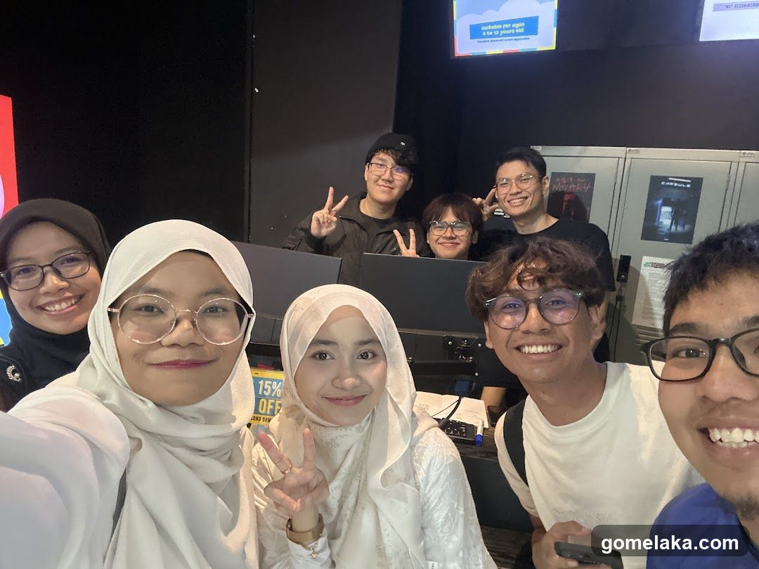Group selfie in indoor setting