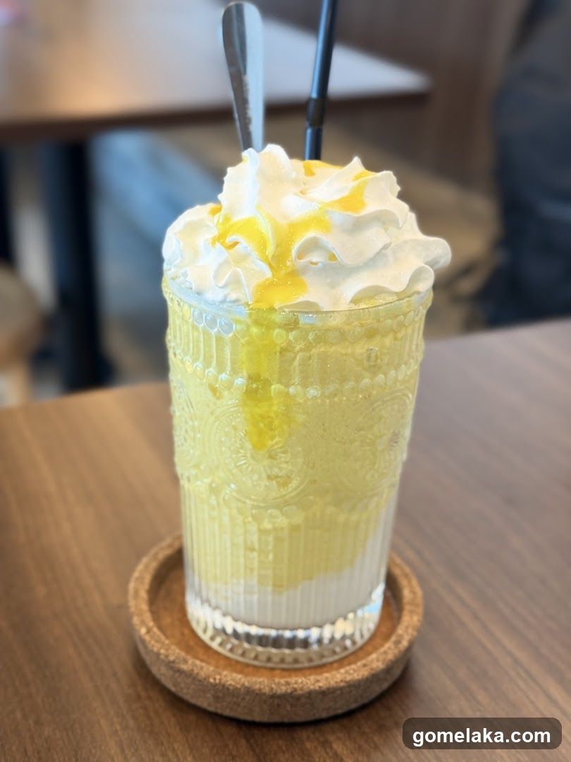 Lemon-themed beverage in decorative glass
