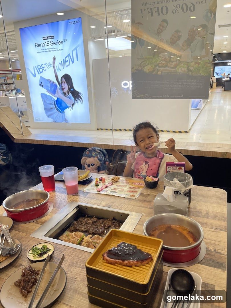 Family dining in mall food court