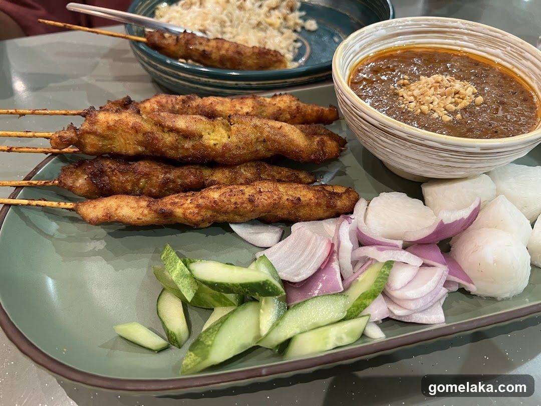Food Plate with Satay and Sambal
