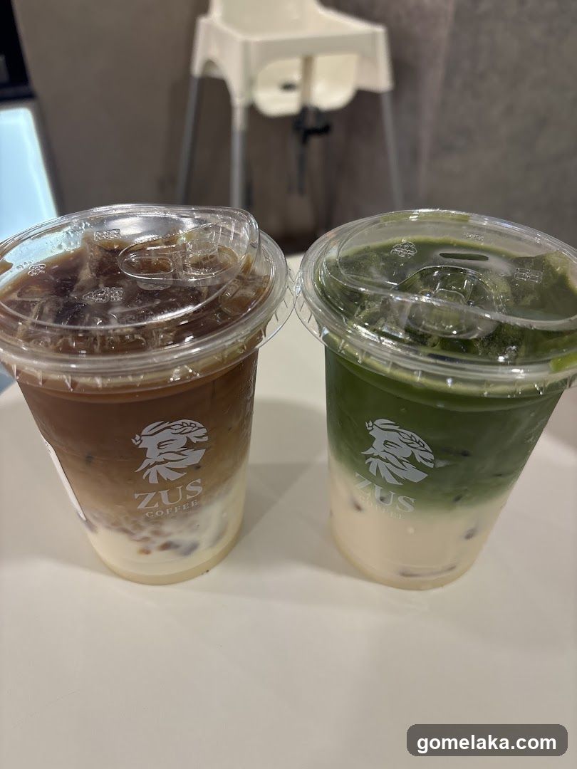 Two iced beverages at a café