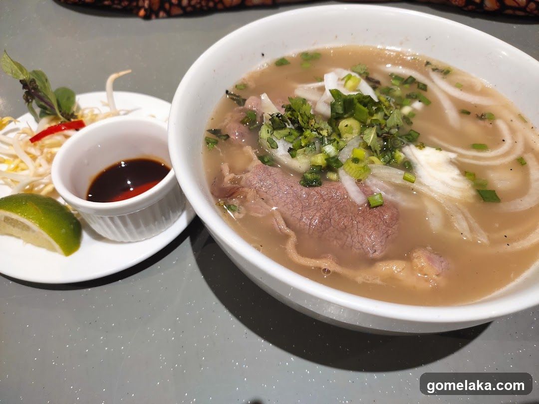 Pho bowl with side dishes