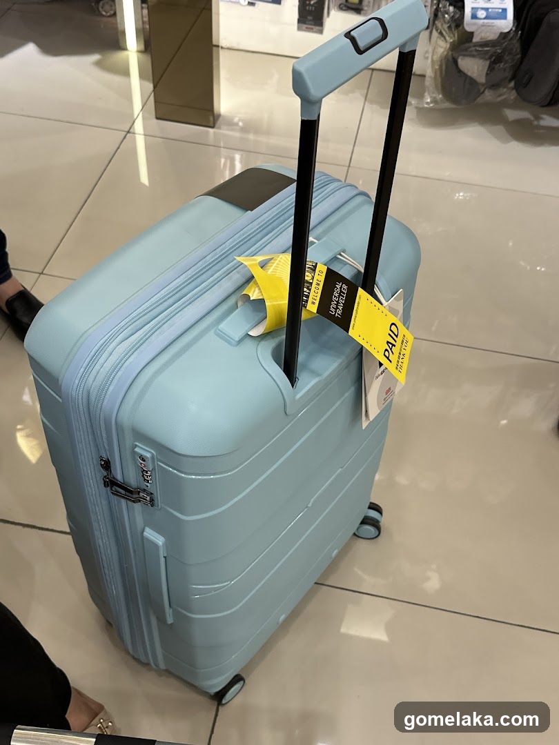 Light blue suitcase in store