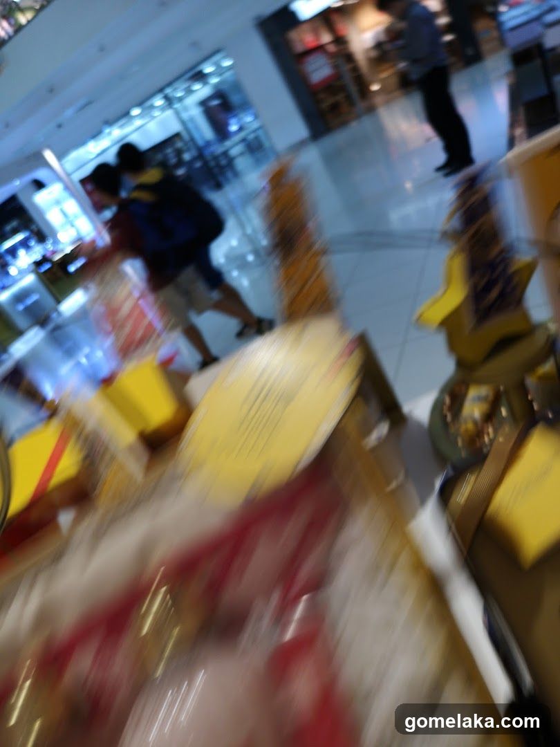 Indoor shopping area with motion blur