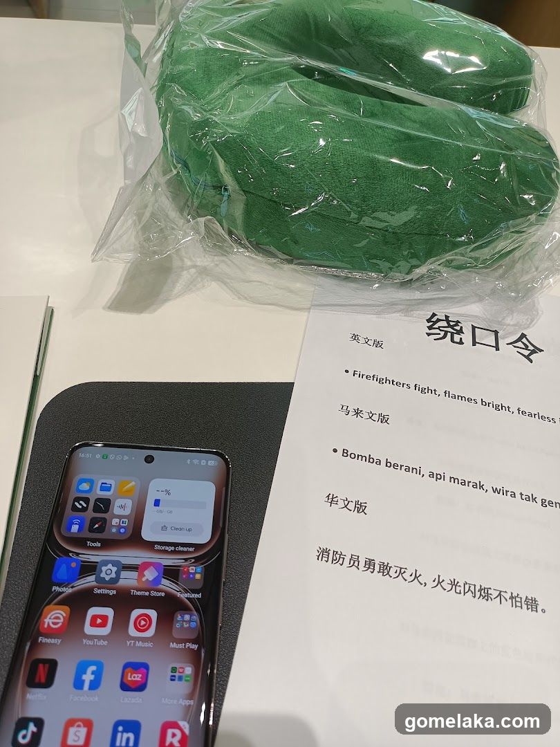 Table with phone, document, and wrapped item