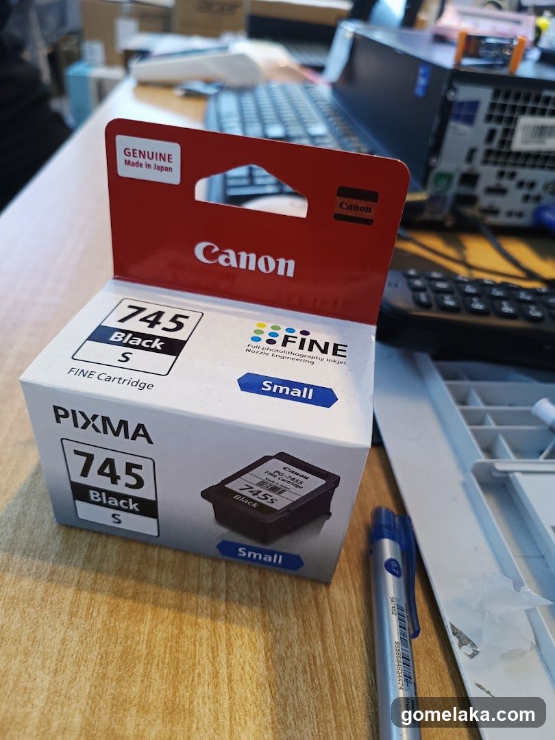 Canon Ink Cartridge Box on Desk