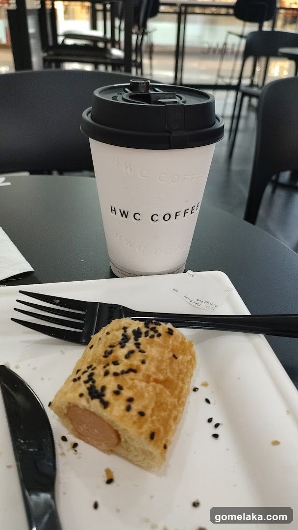 Coffee and pastry at HWC Coffee