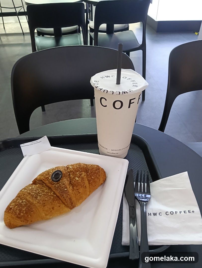 Coffee and pastry at HWC Coffee