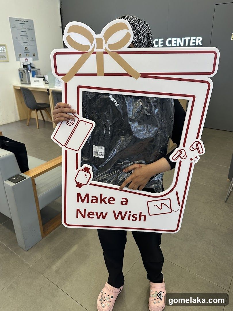 Person Holding Gift Box Sign Inside Store