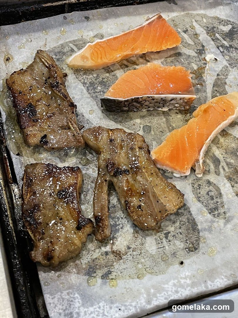 Grilled meat and salmon slices