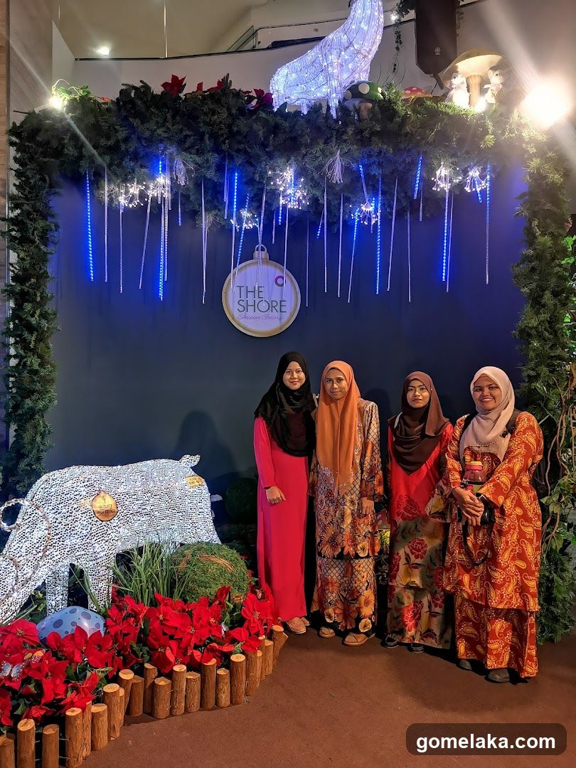 Group photo at festive indoor display