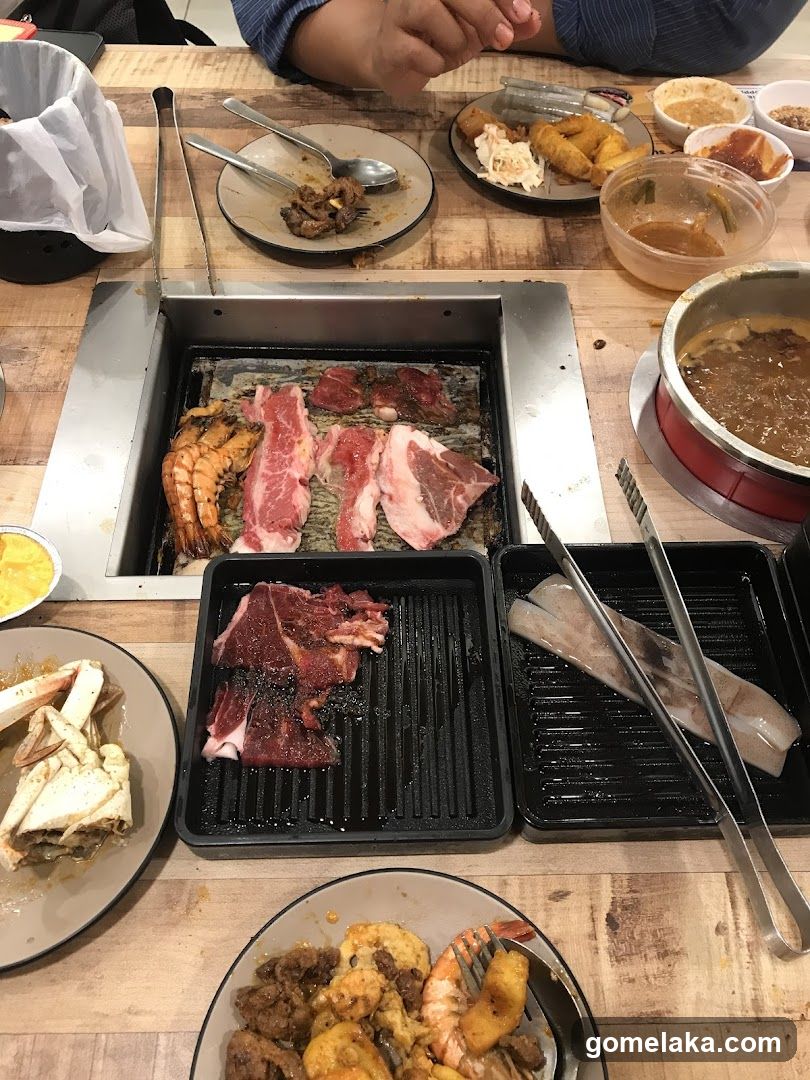 Grilled meat and seafood dining table