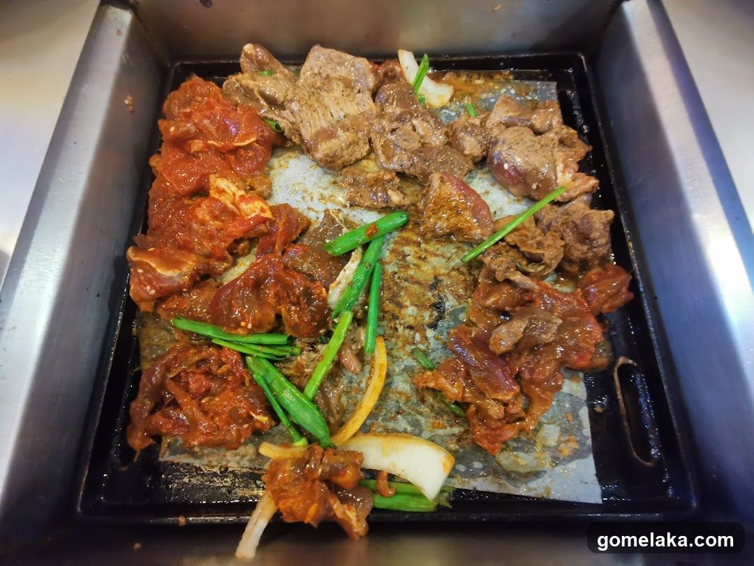 Grilled meat and vegetables on a grill