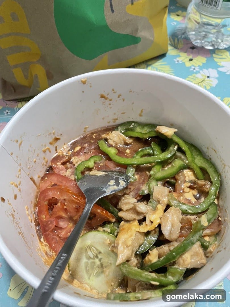 Food in a bowl with spoon