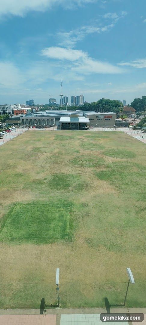 Outdoor Field with Buildings and Cityscape
