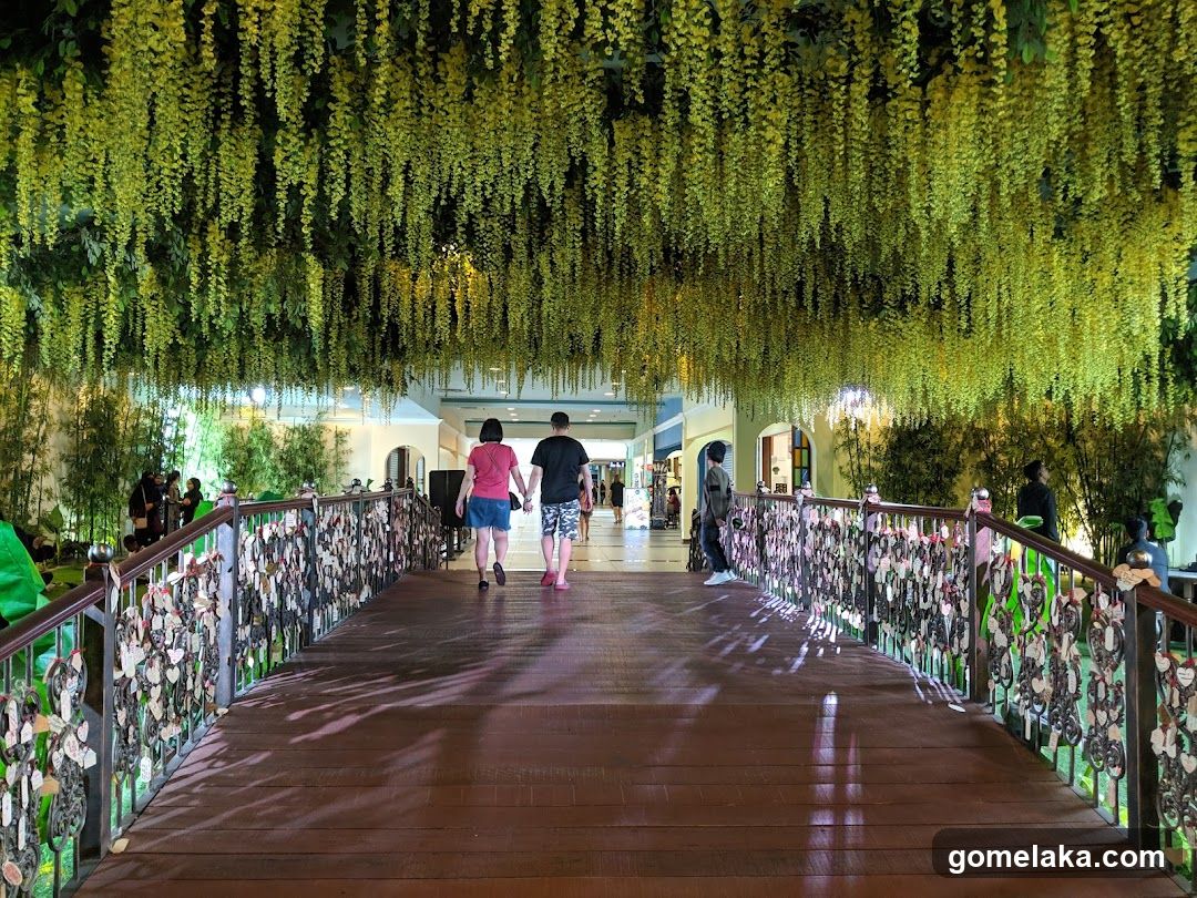 Bridge with Hanging Flowers and Locks