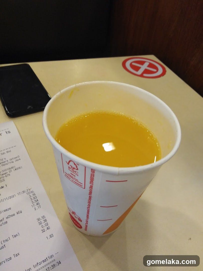 Tabletop with beverage and receipt