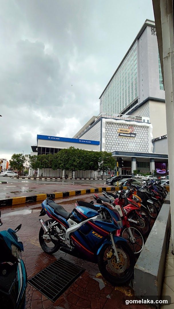 Motorcycles parked outside commercial building