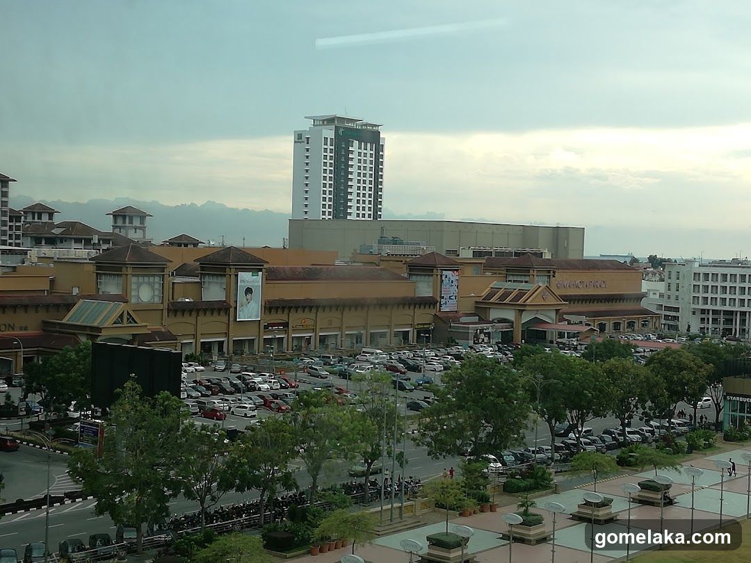 Urban commercial area with parking and buildings