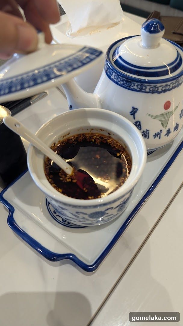 Table Setting with Sauce and Teapot