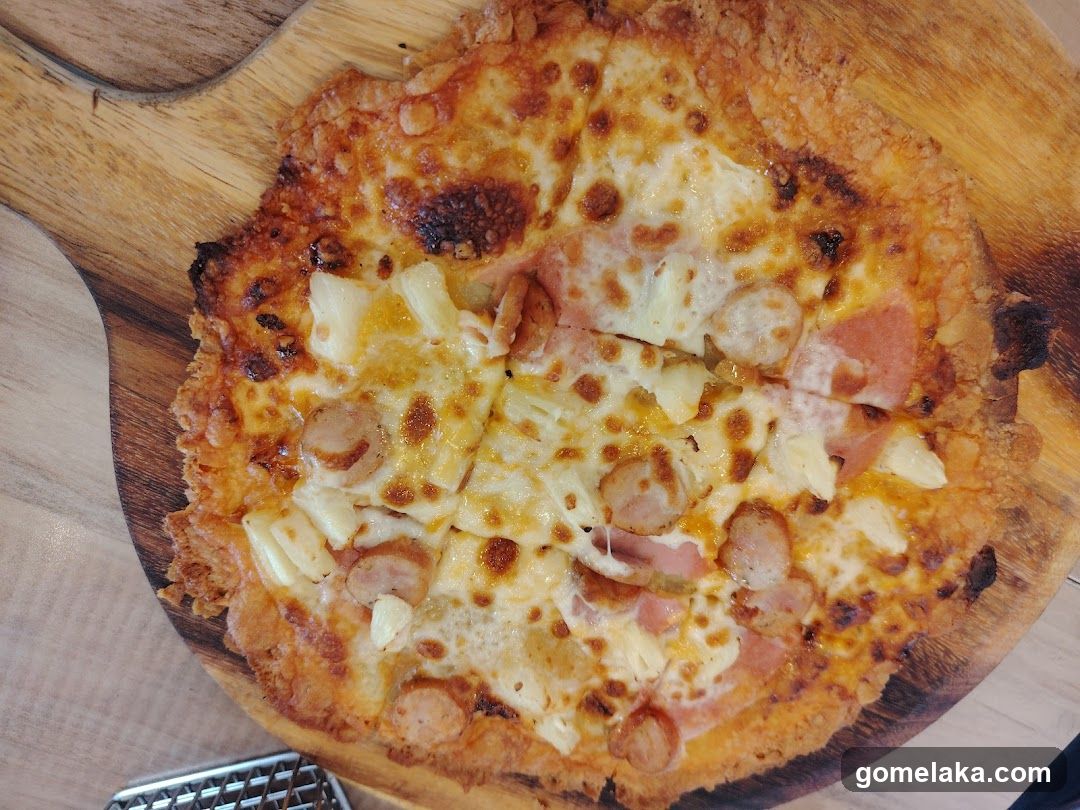 Pizza on wooden serving board