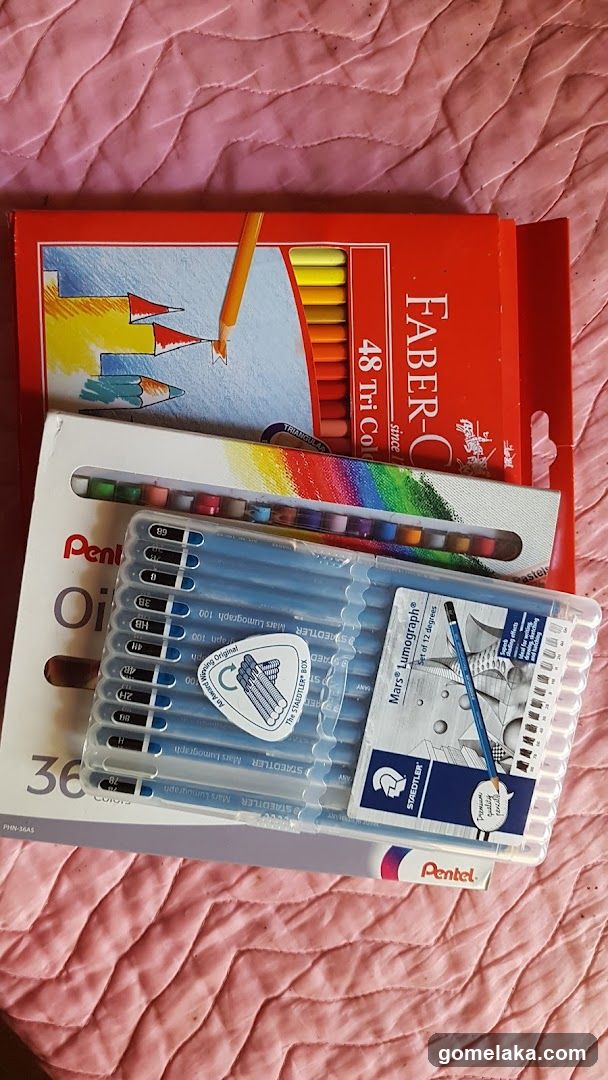 Art Supplies on Pink Surface
