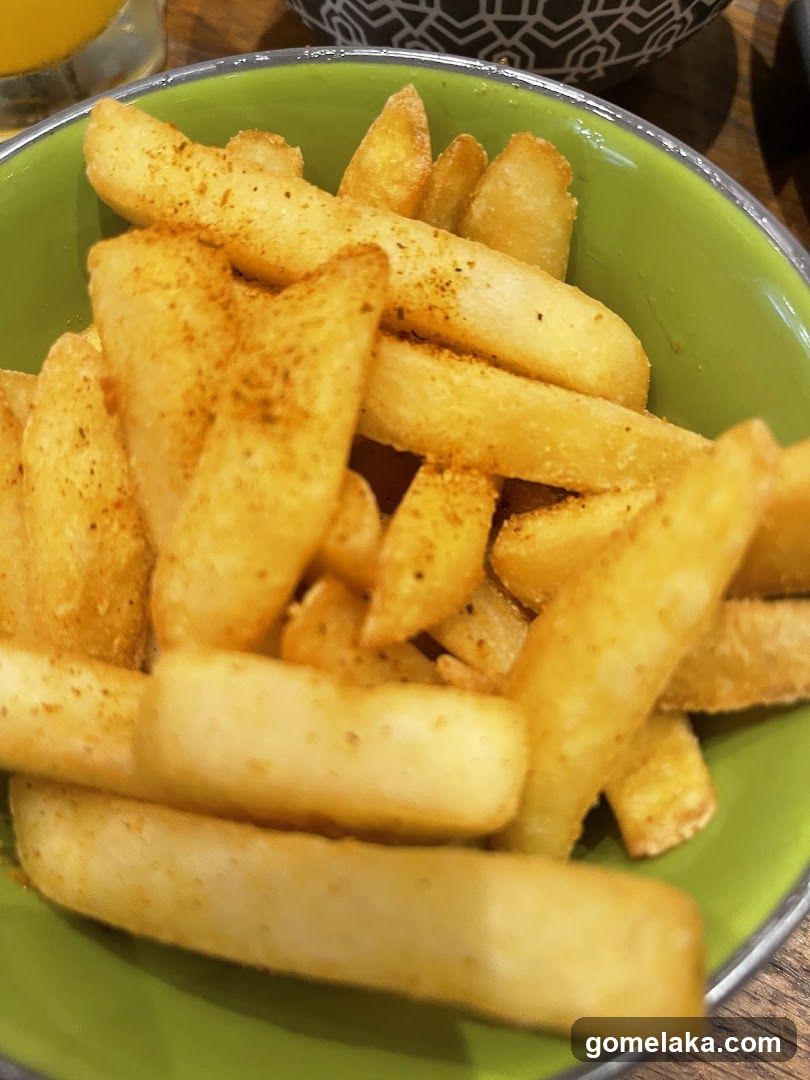 Fries in a green bowl