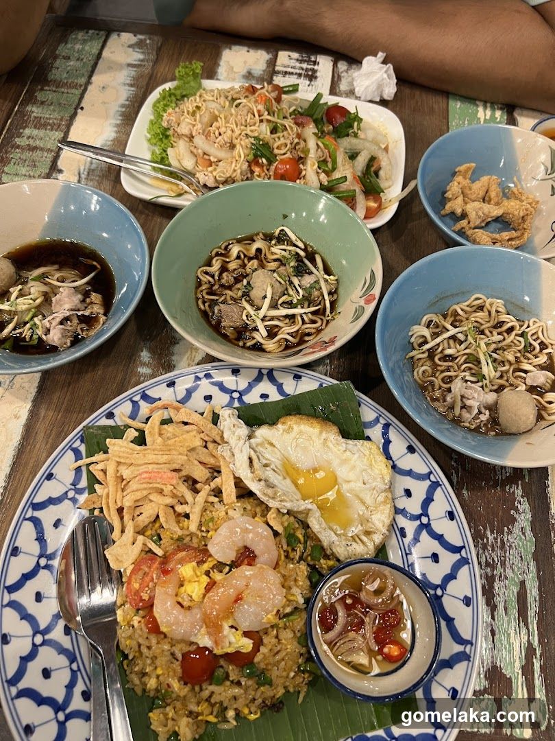 Table with Thai dishes
