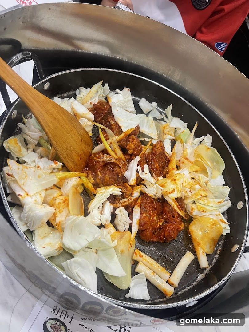 Grilled meat and vegetables in a pan