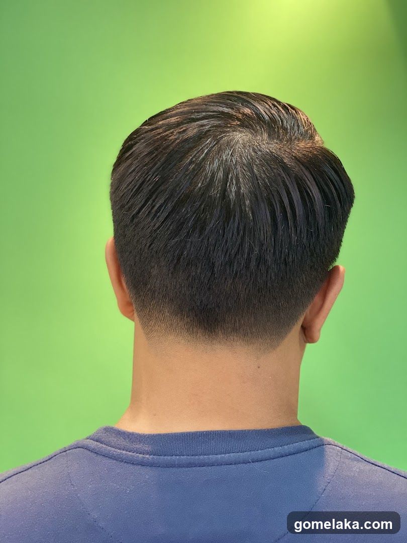 Back view of a person with styled hair