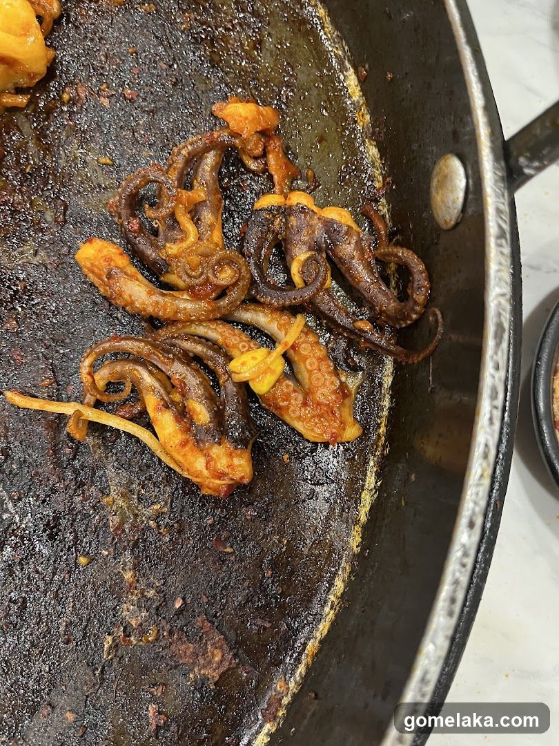 Cooked octopus in pan